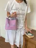 Bolso de Mano Trenzado de Moda Transfronterizo de Nicho Tipo Cubo para Mujer 2026 Nuevo Versátil Cadena Exterior Hombro Cruzado