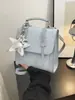 Mochila Sencilla Estilo Coreano Estrella para Mujer 2026 Nueva Moda Trendy Bolso de Mano Mochila Pequeña Casual Elegante