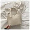 El popular bolso tipo cubo de estilo fresco para mujer de este año es el nuevo modelo de otoño 2026, con una textura ligera y lujosa, adecuado para ir al trabajo y se puede llevar al hombro o cruzado.