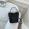 Bolso Cubo Textura Tejida para el Trabajo Nuevo de Moda Verano 2026 Bolso de Hombro Cruzado de Color Sólido de Moda Bolso de Mano Personalizado