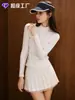 Conjunto de tenis estilo coreano más vendido para mujer, conjunto de dos piezas con cuello alto, cremallera, mangas largas de encaje, falda plisada anti-exposición para fitness y golf