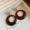 Pendientes de borla con carcasa de madera marrón transfronterizos europeos y americanos, pendientes de estilo vintage Maillard, pendientes de mujer de lujo ligero de alta gama