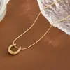 Collar con Colgante de Corazón de Acero de Titanio para Mujer, Estilo de Lujo Ligero Europeo y Americano, Diseño Único de Nicho, Joyería que No se Desvanece