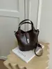 Bolso cubo de alta gama, diseño de nicho para mujer, nueva colección 2026, adecuado para el trabajo diario, se puede llevar como bolso cruzado, bolso de mano o bolso de hombro