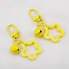Llavero con Colgante de Campana de Estrella de Cinco Puntas de Colores Caramelo de Aleación Cubierta para Auriculares Decoración de Pareja