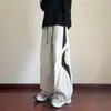 Pantalones rectos de diseño color block para exteriores estilo americano para hombre, pantalones casuales holgados de marca de moda de verano para parejas