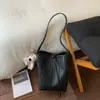 Bolso Pequeño Versátil de Alta Gama para Cruce de Fronteras de Gran Capacidad Estilo Nuevo Primavera 2026 Bolso de Hombro Único para Debajo del Brazo de Mujer Bolso Cubo