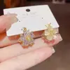 Pendientes para Mujer Lujo Ligero Gama Alta Moda Hebilla de Oreja Simple Venta al por Mayor Nicho Delicados Pendientes de Gama Alta Accesorios de Joyería Elegantes