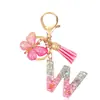Moda Novo Rosa Cola Pingando Letra Chaveiro Lantejoulas Borboleta Franja Pingente Acessórios Bolsa Pendurar Enfeites Atacado