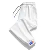 Calça casual direta da fábrica calça de moletom masculina primavera e outono estilo coreano moderna versátil solta leggings esportivas calça comprida