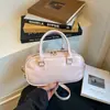 Bolsa de ombro 2026 novo modelo de primavera, bolsa de axila de nicho de alta qualidade para o dia a dia, bolsa transversal, bolsa feminina de designer