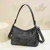 Bolsa de comércio exterior feminina 2025 novo modelo bolsa de mamãe versátil bolsa de ombro de grande capacidade couro macio bolsa tote multicamadas bolsa de axila