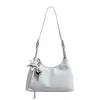 Bolsas femininas de alto valor nicho 2026 nova bolsa de ombro retrô minimalista cor sólida bolsa de axila bolsa de ombro único transversal estilosa brilhante