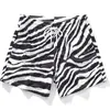 Venta Caliente Transfronteriza de Amazon Pantalones Cortos Estampado de Leopardo Impresión 3D Versátiles Casual Americano para Hombre Pierna Ancha Verano Holgados Venta al por Mayor