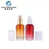 En stock nuevo botella de aceite esencial de fondo grueso 30 ml botella de esencia de hombro redondo botella con gotero de cabeza de goma cabeza de bomba botella de aceite esencial de vidrio
