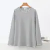 Nueva camiseta de rayas para mujer Otoño/Invierno 2026, de cuello redondo, manga larga, versátil, casual, adelgazante, corte holgado, camiseta básica