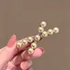 Pinza para el pelo de estilo elegante de alta gama, estilo cruz de perla color champán, pinza lateral versátil para flequillo y cabello fino, pinza de pico de pato, accesorio para el cabello para mujer