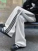 Pantalones deportivos largos de marca de moda, holgados, a rayas, con caída, de pierna ancha, para hombre, pantalones de chándal de otoño, pantalones casuales rectos pesados de estilo americano