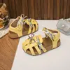Sandalias de Diadema Tejida Estilo Mori para Niñas 2026 Nuevo Verano Zapatos de Princesa Huecos con Lazo para Niña Pequeña Zapatos de Playa