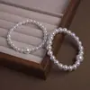 Promoção Quente Toque de Luxo Shi Jia Seda Pérola Branca Australiana Pulseira Luxo Leve Moda Versátil 2026 Nova Promoção Quente Joias de Mão