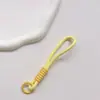 Correa de Muñeca Trenzada Estilo Ins Lanyard Nudado Cuerda Corta de Silicona Colgante Antiperdida para Teléfono Dopamina