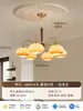 Iluminación Zhongshan al por mayor Lámpara de araña vintage francesa para sala de estar Luz principal retro para dormitorio Estilo frijol mágico color crema Lámpara de hierro para comedor