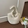 Bolsa de Tote Transfronteriza Bolsa Tejida Hueca para Mujer 2026 Nuevo Estilo Bolso de Hombro Casual para Viaje Gran Capacidad Bolsa de Playa para la Costa