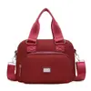 Primavera 2026 Nuevo Más Vendido Bolso de Hombro Único para Mujer Tela de Nailon Transfronterizo Moderno Bolso de Mano Multifuncional de Doble Hombro para Mujer