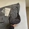 Bolso grande de estrella y luna de nicho estilo coreano de alta costura, nuevo modelo 2026, bolso casual de un solo hombro bajo el brazo estilo ins
