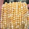Cuentas sueltas de jade beige natural productos semiacabados, cuentas redondas de jade amarillo, joyería de estilo chino nuevo suministrada directamente por el fabricante