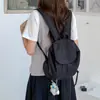 Mochila de gran capacidad estilo coreano con tapa abatible, nueva bolsa casual de nailon de doble hombro 2026, mochila escolar deportiva para estudiantes, moderna y versátil