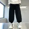 Calça de Moletom Forrada com Fleece Outono/Inverno para Meninos 2025 Nova Malha Grossa Calças Venda por Atacado Tendência