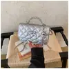 Nova bolsa de corrente com padrão de losangos, bolsa quadrada pequena fashion e versátil, bolsa para batom, bolsa feminina, moderna para o trabalho e para o dia a dia, bolsa estilo Chanel