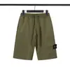 Pantalones Cortos de Color Sólido con Parche de Brújula Estilo Nuevo Europeo y Americano Transfronterizos para Hombres y Mujeres con Decoración de Bolsillo Grande Pantalones de Cinco Puntas