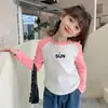 Camiseta Básica de Cuello Redondo para Niñas Moda Primavera y Otoño 2026 Manga Larga Popular para Niños y Bebés con Dobladillo Curvo