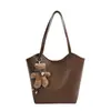 Bolsa de gran capacidad de comercio exterior con sensación relajada para mujer, nueva de 2026, simple, versátil, bandolera única, bolsa de mano para el trabajo