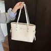 Bolso tote para mujer, nuevo estilo 2026, diseño moderno y minimalista, patrón tejido, adecuado para el trabajo y los desplazamientos, bolso de hombro para mujer, transfronterizo