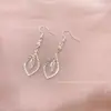 Pendientes de Hoja Minimalistas y Elegantes Transfronterizos Europeos y Americanos, Pendientes de Gota Hueca de Alta Gama, Accesorios de Oreja Geométricos Creativos Versátiles