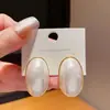 Pendientes de plata con baño de oro real, aguja cuadrada, borla de perla y circonita, pendientes de lujo ligero de alta gama, fabricante de pendientes vintage