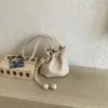 Bolsa de couro macio estilo minimalista com fecho de cordão, nova bolsa versátil 2026 com padrão lichia para ombro e transversal, bolsa de mão feminina da sorte