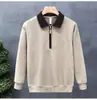 Sudadera con Cremallera a Media Altura y Cuello Alto Estilo Urbano de Moda para Hombre Primavera/Otoño 2026 Nuevo Diseño Bloque de Color Prenda Base Superior