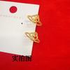 Anillo de trébol de cuatro hojas con cuentas de transferencia Shajin, diseño de nicho de moda, anillo de ojo de gato en color dorado.
