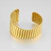 Acero de titanio chapado en oro de 18 quilates transfronterizo nueva ola de moneda patrón vertical irregular personalidad moda pulsera abierta B242473