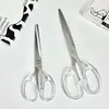 Tijeras transparentes esmeriladas, compactas y portátiles, con un diseño elegante, duraderas y adecuadas para estudiantes y uso de oficina.; unas tijeras de dibujos animados lindas y de tamaño mini
