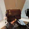 Bolsa de Moda Casual com Design de Nicho, Novo Estilo, Textura Simples, Bolsa de Ombro Único Transversal, Bolsa Quadrada Pequena Vintage Primavera 2026