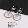 Aleación de zinc K blanca colección de llaveros multiestilo DIY hecho a mano casero colgante para coche hebilla de conexión para equipaje pequeños accesorios