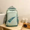 Mochila Escolar para Mulheres 2026 Nova de Aparência Sofisticada Costura em Contraste Moda Casual para Alunos do Ensino Fundamental e Médio Mochila Versátil