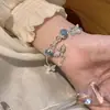 Nova Pulseira Borboleta com Contas Azuis para Mulheres, Design de Nicho de Luxo Leve, Doce e Elegante, Joia de Cristal Exquisite para Estudantes e Melhores Amigas