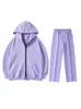 Conjunto de sudadera unisex negra con capucha y cierre, que incluye una sudadera holgada abierta por delante y pantalones de chándal de pierna recta con cordones, un conjunto de dos piezas