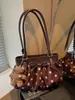 Nuevo bolso de hombro plisado de lunares estilo coreano de nicho transfronterizo, bolso de hombro casual para el día a día, bolso de axila exquisito y moderno